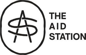 Sponsor Logo for The Aid Station Running Supply Company