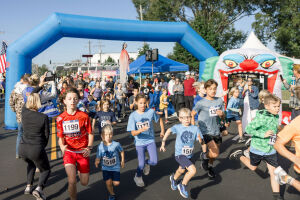 View Photos by Kait Photography in new tab