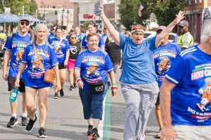 View HOLY CANNOLI 2 MILE WALK in new tab