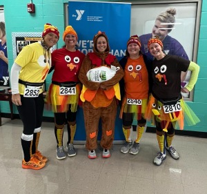 YMCA 3rd Annual " Huffin for the Stuffin" Turkey Trot 5K logo