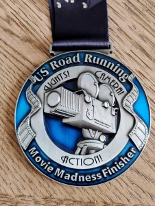 Movie Mandess Virtual 5K, 10K, 13.1M, & 26.2M (April 2026) — race logo