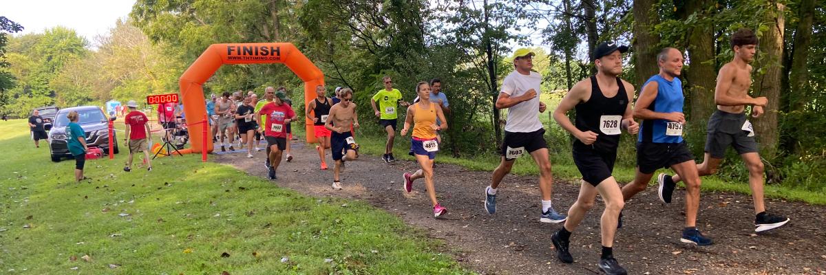 Wolcottville community runners starting the 5K Fun Run together