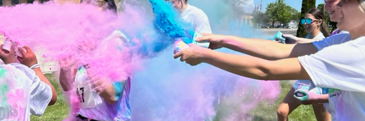 Neon powder station after the race with NHS members- optional