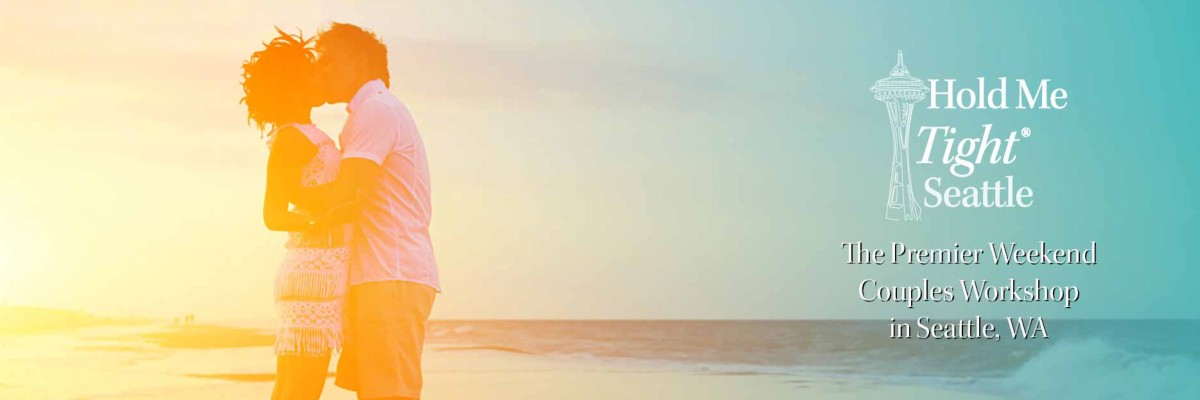Asian Couple standing on beach