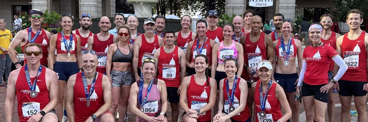 Capital Area Runners group celebrating after the Reston Firecracker 5k on July 4th.