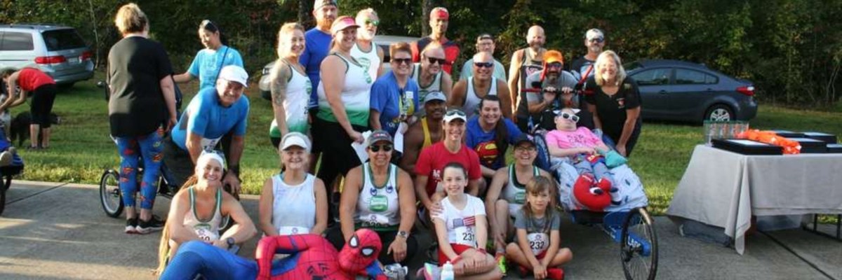 Runners and families at The Champions Run for Special Children
