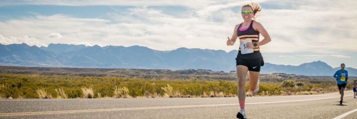 page banner: runner running giving a thumbs up